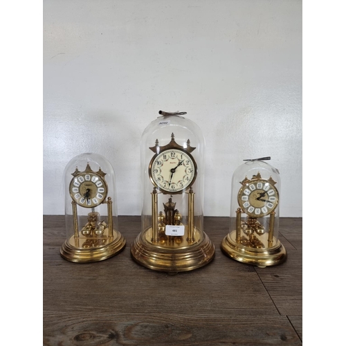 481 - Three brass anniversary clocks - largest approx. 30cm high