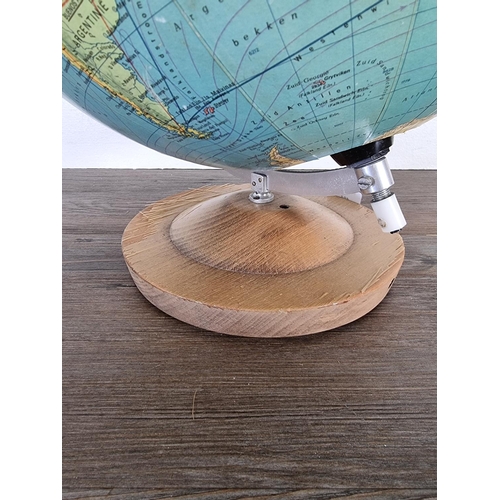 484 - A mid 20th century Paul Rath illuminating globe on beech stand - approx. 44cm high