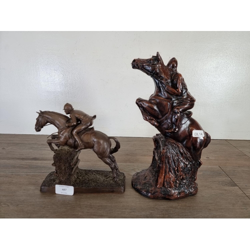 487 - Two bronze effect horse and jockey figurines, one 29cm and one Heredites Ltd 19cm