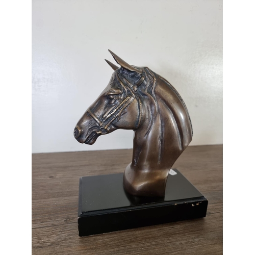 488 - Five bronze effect horse figurines - largest approx. 24cm high