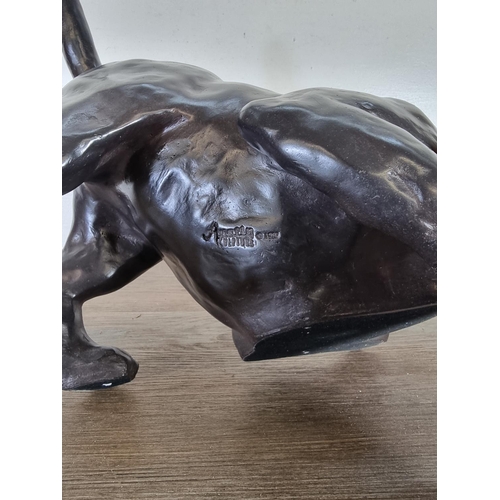 492 - A 1980s Austin bronze effect dog sculpture - approx. 29cm high x 20cm wide x 34cm long