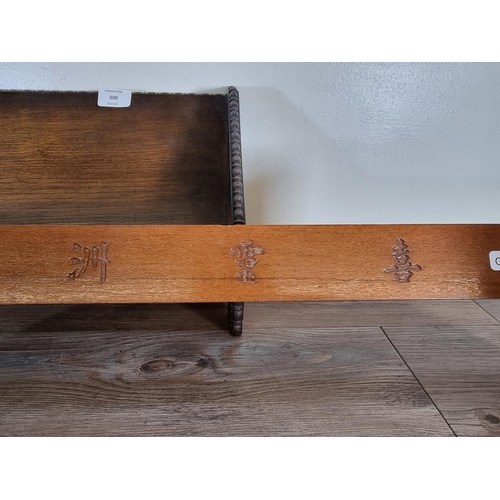 500 - Two wooden book troughs, one 1920s/30s beaded oak - approx. 21cm high x 45cm wide x 22cm deep and on... 