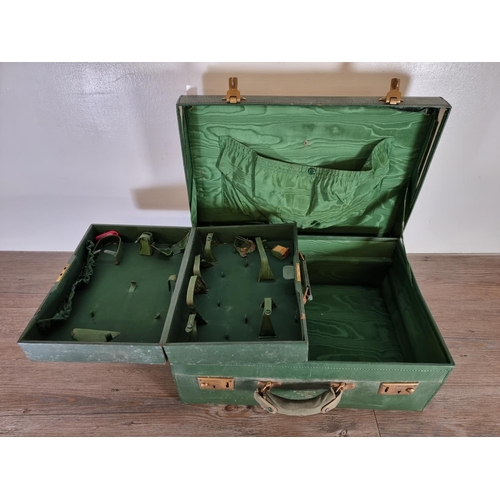 506 - An early 20th century green leather travel vanity case - approx. 19cm high x 50cm wide x 35cm deep