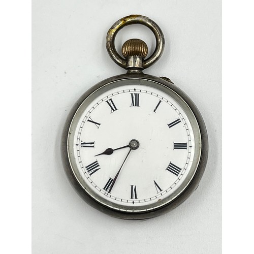 1148 - An antique 0.935 silver cased open face hand wind lady's pocket watch