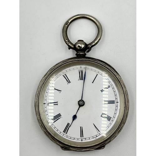 1149 - An antique 0.935 silver cased open face key wind lady's pocket watch