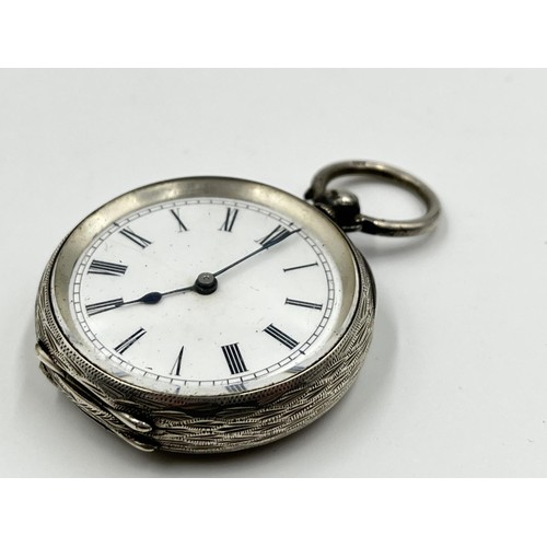 1149 - An antique 0.935 silver cased open face key wind lady's pocket watch