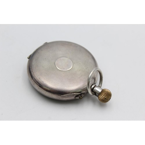 1162 - A .925 silver cased open face hand wind pocket watch - approx. gross weight 69 grams