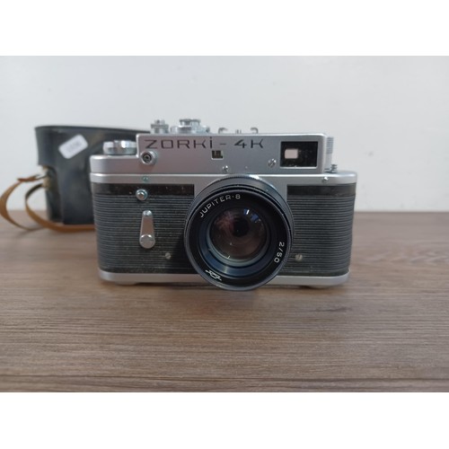 644 - A cased KMZ Zorki-4 35mm rangefinder camera fitted with Jupiter-8 50mm f/2 lens