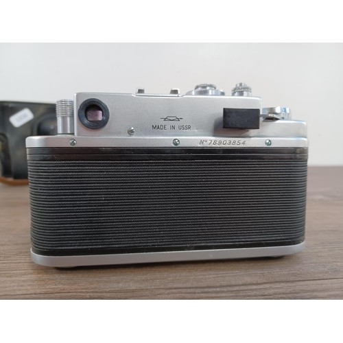 644 - A cased KMZ Zorki-4 35mm rangefinder camera fitted with Jupiter-8 50mm f/2 lens