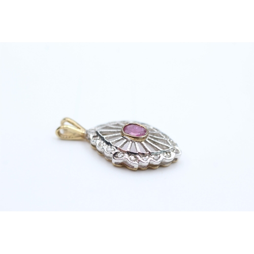 2005 - A 9ct gold ruby and diamond ornate openwork pendant - approx. gross weight 1.2 grams