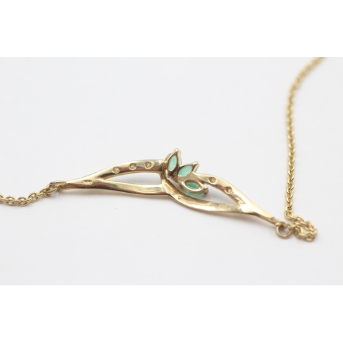 2012 - A 9ct gold emerald and diamond static pendant necklace - approx. gross weight 3.5 grams