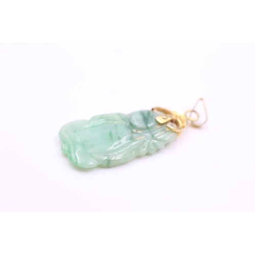 2017 - A 14ct gold and carved jade pendant - approx. gross weight 2.3 grams