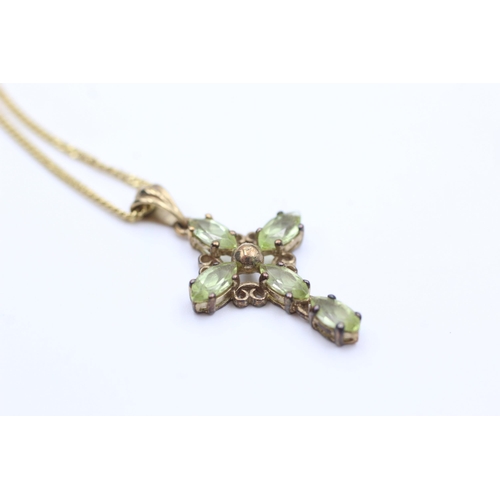 2025 - A 9ct gold peridot set cross pendant necklace - approx. gross weight 3.3 grams