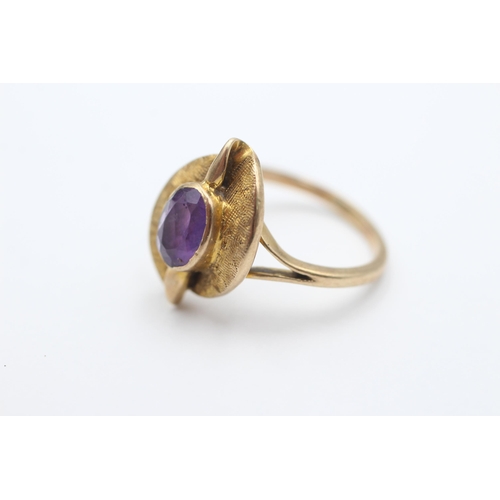 2038 - A 9ct gold amethyst stylised statement ring, size P - approx. gross weight 4.1 grams