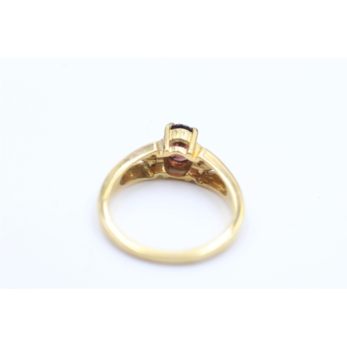 2041 - A 9ct gold diamond and garnet ring, N ½ - approx. gross weight 3 grams