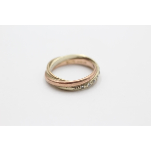 2047 - A 9ct yellow, rose and white gold trinity ring, size I - approx. gross weight 2.8 grams