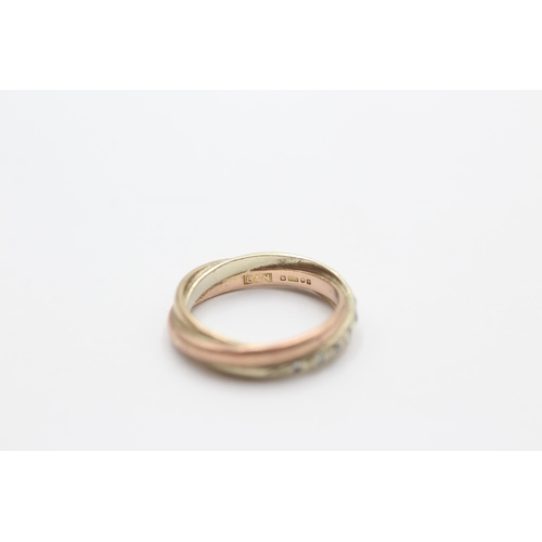 2047 - A 9ct yellow, rose and white gold trinity ring, size I - approx. gross weight 2.8 grams