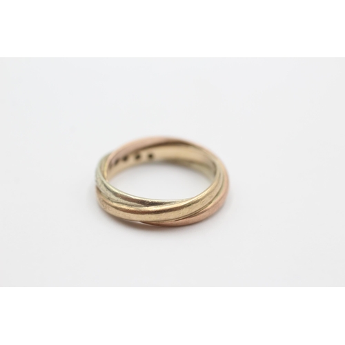 2047 - A 9ct yellow, rose and white gold trinity ring, size I - approx. gross weight 2.8 grams