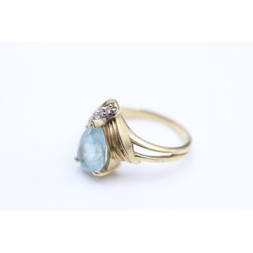 2053 - A 9ct gold topaz and clear gemstone dress ring, size N - approx. gross weight 3.86 grams