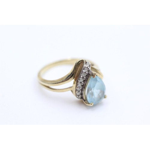 2053 - A 9ct gold topaz and clear gemstone dress ring, size N - approx. gross weight 3.86 grams