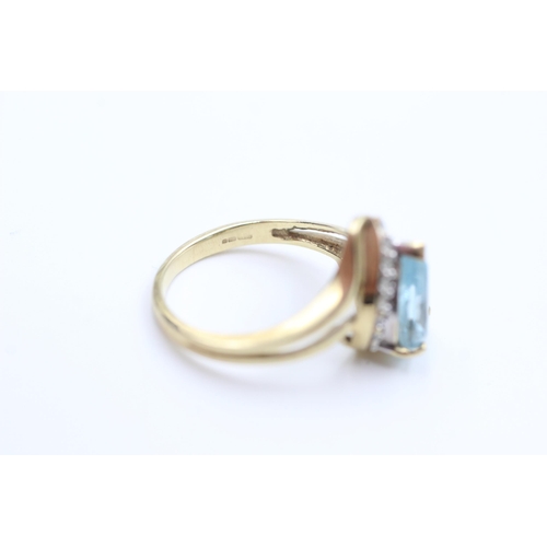 2053 - A 9ct gold topaz and clear gemstone dress ring, size N - approx. gross weight 3.86 grams