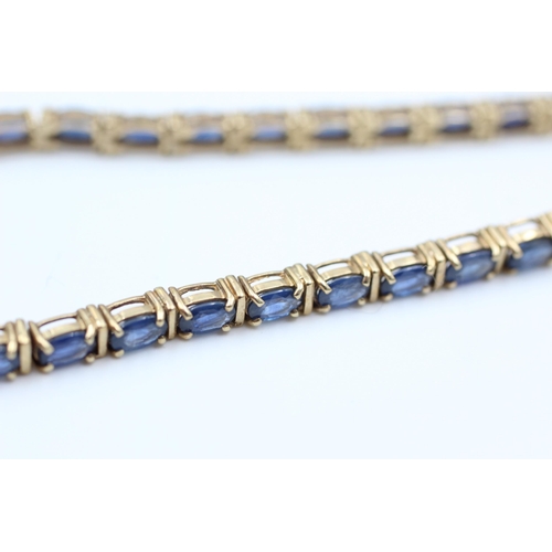 2055 - A 9ct gold sapphire tennis bracelet - approx. gross weight 10.3 grams