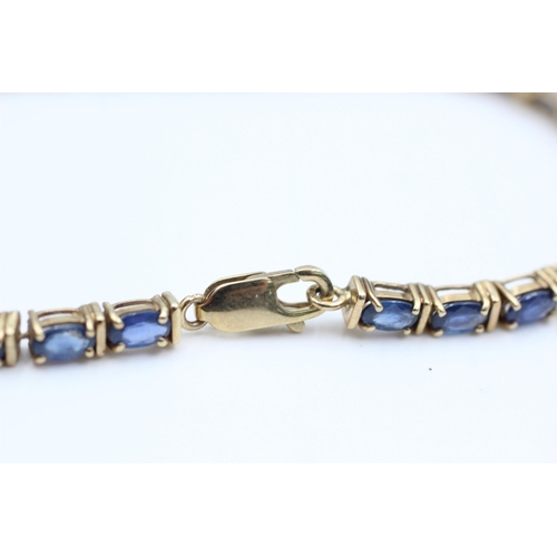 2055 - A 9ct gold sapphire tennis bracelet - approx. gross weight 10.3 grams