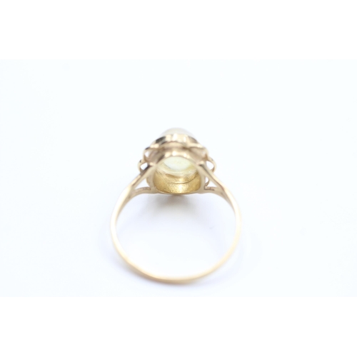 2056 - A 9ct gold stone set dress ring, size Q - approx. gross weight 2.5 grams