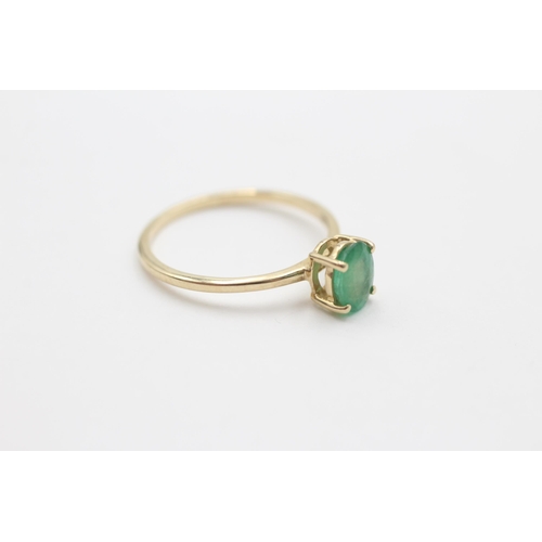 2059 - A 10ct gold emerald single stone dress ring, size L - approx. gross weight 1.2 grams