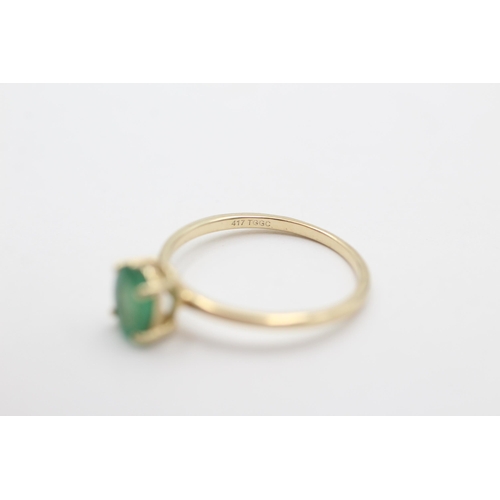 2059 - A 10ct gold emerald single stone dress ring, size L - approx. gross weight 1.2 grams