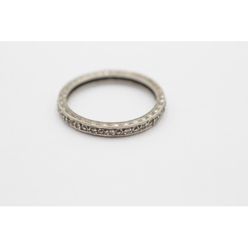 2062 - A 9ct white gold diamond eternity ring, size O - approx. gross weight 1.9 grams