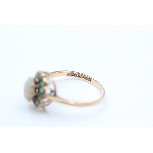 2072 - A 9ct gold opal and emerald halo dress ring, size Q - approx. gross weight 2.2 grams