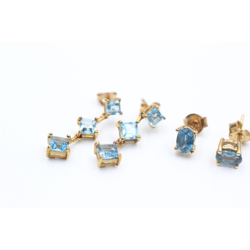 2085 - Three pairs of 9ct gold gemstone stud earrings, two topaz and one iolite - approx. gross weight 4.2 ... 