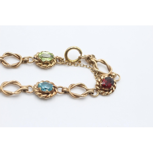 2086 - A 9ct gold amethyst, zircon, peridot, citrine, topaz and garnet rope link bracelet - approx. gross w... 