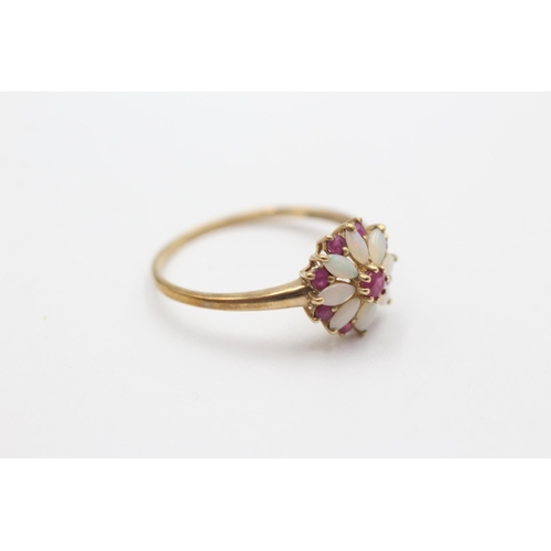 2090 - A 9ct gold ruby and opal floral ring, size V - approx. gross weight 2.1 grams