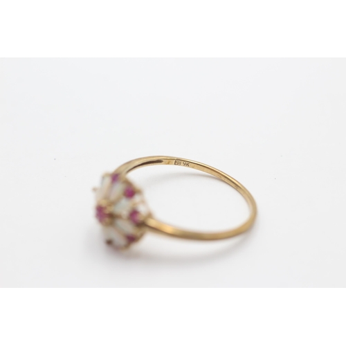 2090 - A 9ct gold ruby and opal floral ring, size V - approx. gross weight 2.1 grams