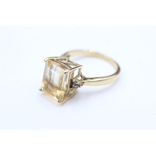 2093 - A 9ct gold citrine and quartz statement ring, size N½ - approx. gross weight 4 grams