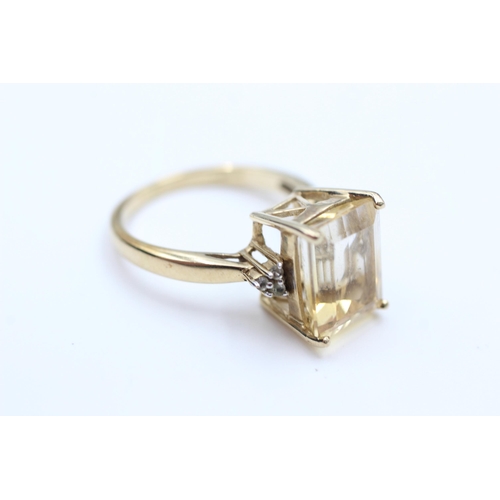 2093 - A 9ct gold citrine and quartz statement ring, size N½ - approx. gross weight 4 grams