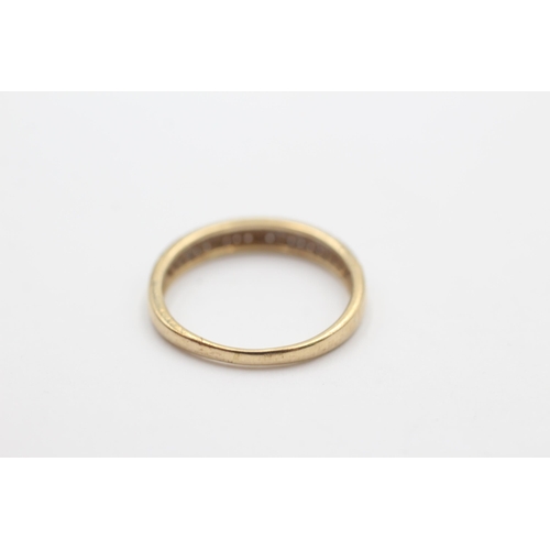 2095 - A 9ct gold clear gemstone triple row half-eternity ring, size P - approx. gross weight 1.8 grams