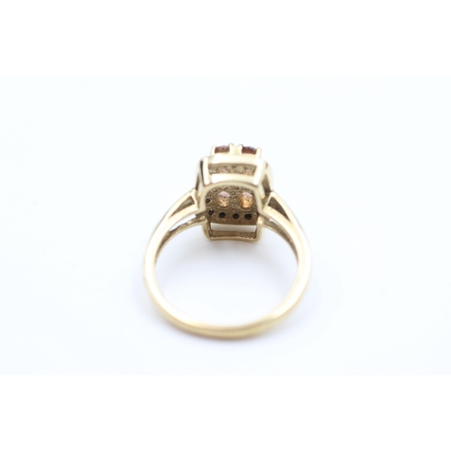 2100 - A 9ct gold black moissanite and topaz cluster dress ring, size N½ - approx. gross weight 4.1 grams