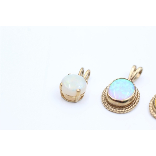 2110 - Three 9ct gold gemstone solitaire pendants, two opal and one citrine - approx. gross weight 3.9 gram... 