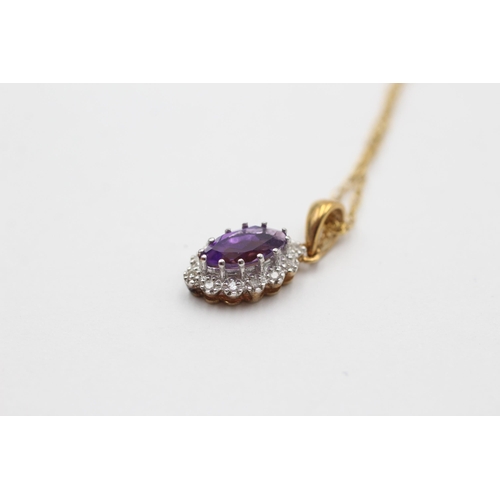 2111 - A 9ct gold amethyst and diamond halo pendant necklace - approx. gross weight 1.5 grams