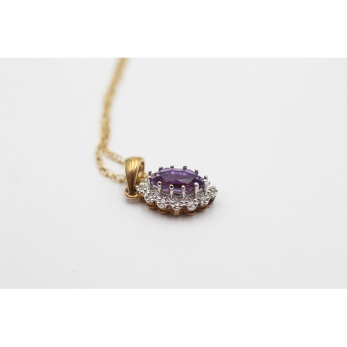 2111 - A 9ct gold amethyst and diamond halo pendant necklace - approx. gross weight 1.5 grams