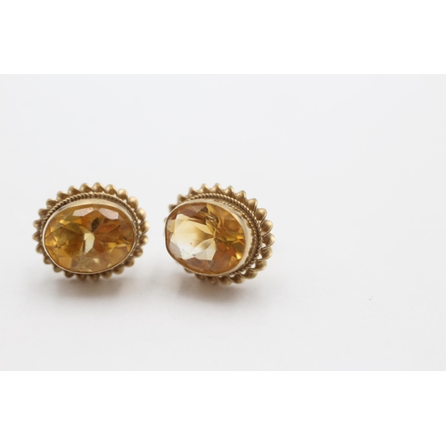 2119 - A pair of 9ct gold citrine stud earrings - approx. gross weight 2.7 grams