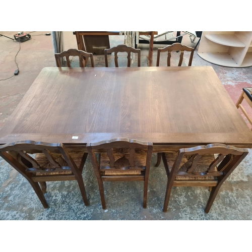 111 - A French style beech rectangular extending dining table and six matching chairs - approx. 76cm high ... 