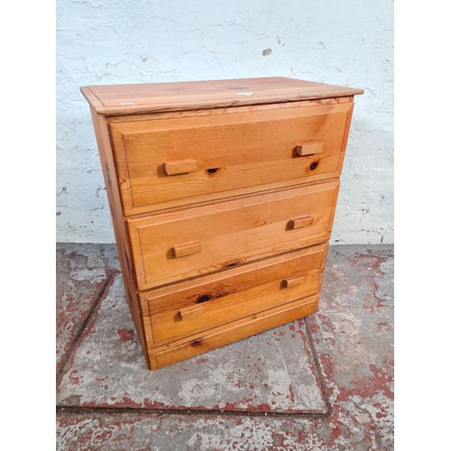 106 - A modern pine chest of three drawers