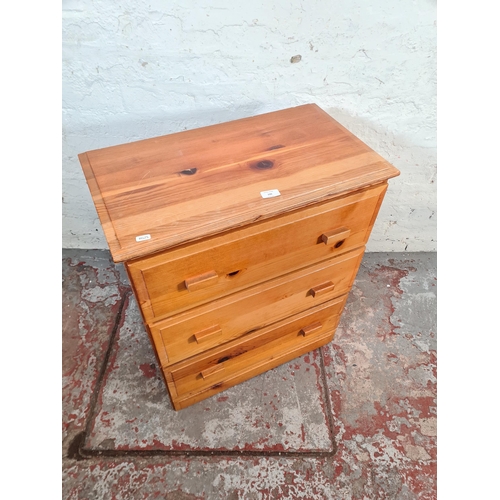 106 - A modern pine chest of three drawers