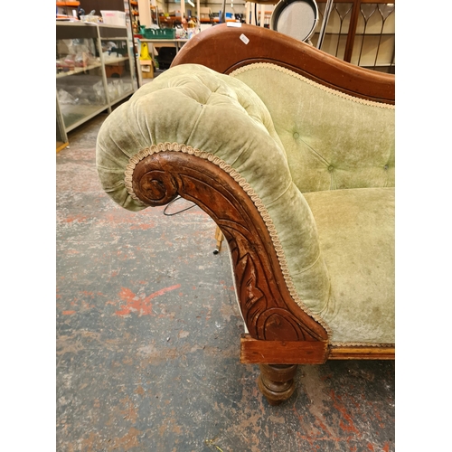 55 - A late 19th century mahogany and green fabric upholstered double ended sofa - approx. 89cm high x 21... 