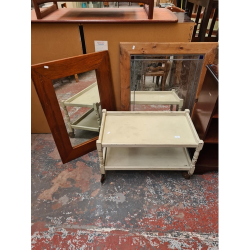 85 - Four pieces of furniture, pine framed wall mirror, mahogany framed wall mirror, mahogany three tier ... 