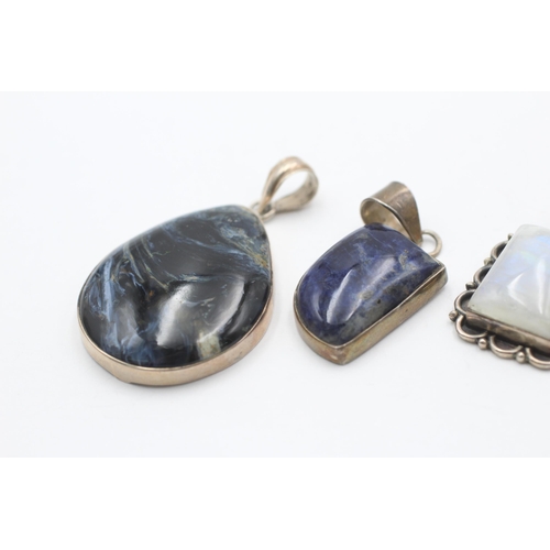 2186 - Four .925 silver gemstone pendants to include moonstone, lapis lazuli etc. - approx. gross weight 52... 